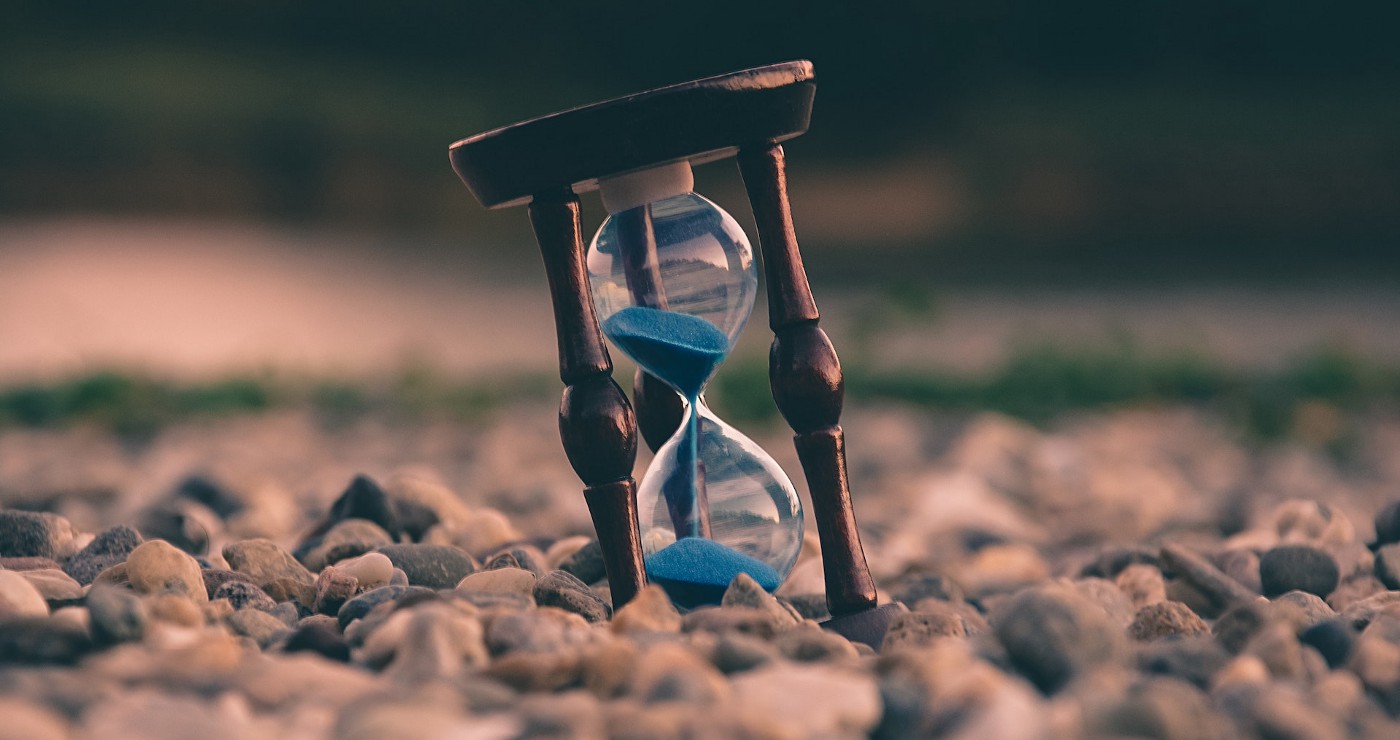 Sand clock Photo by Aron Visuals on Unsplash